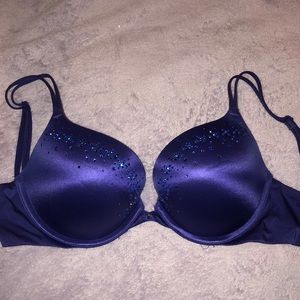Purple push up bra with rhinestones.